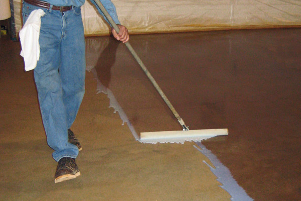 Padco Floor Coater on a concrete surface